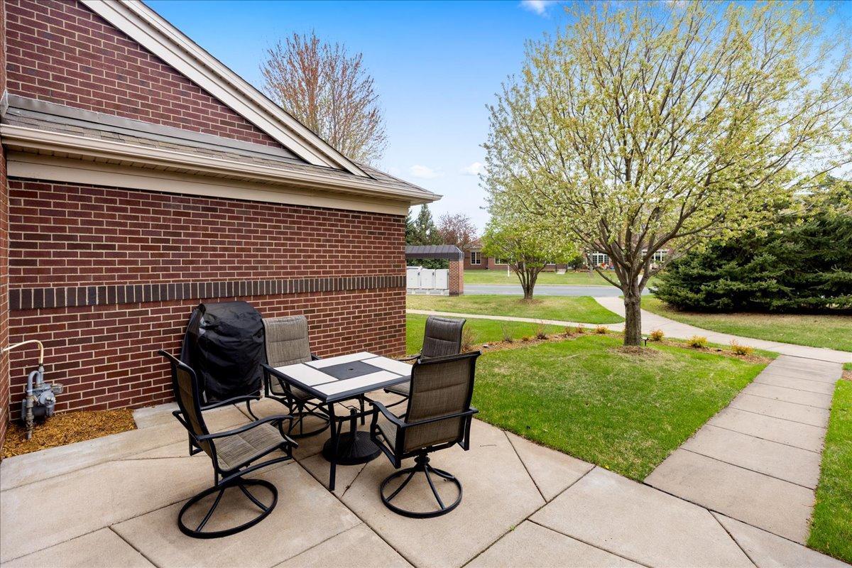 Private Patio Living in The Lakes Community with Peaceful Green Space Views