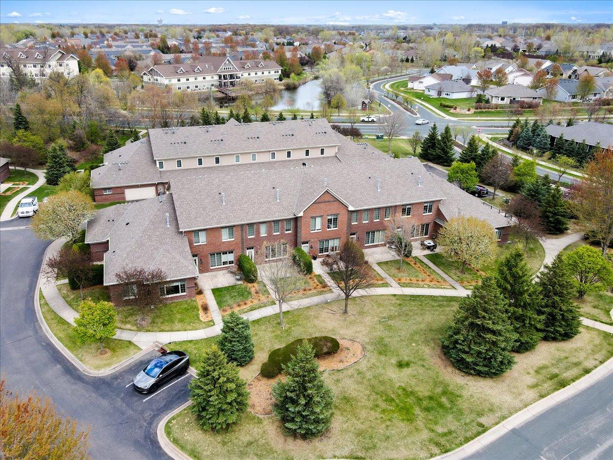 A Bird’s Eye View of a Connected, Walkable Community with Water and Green Space Nearby