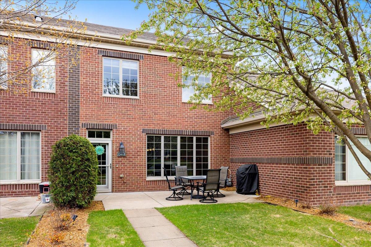 Your own private entry and patio: low-maintenance living with space to relax outdoors.