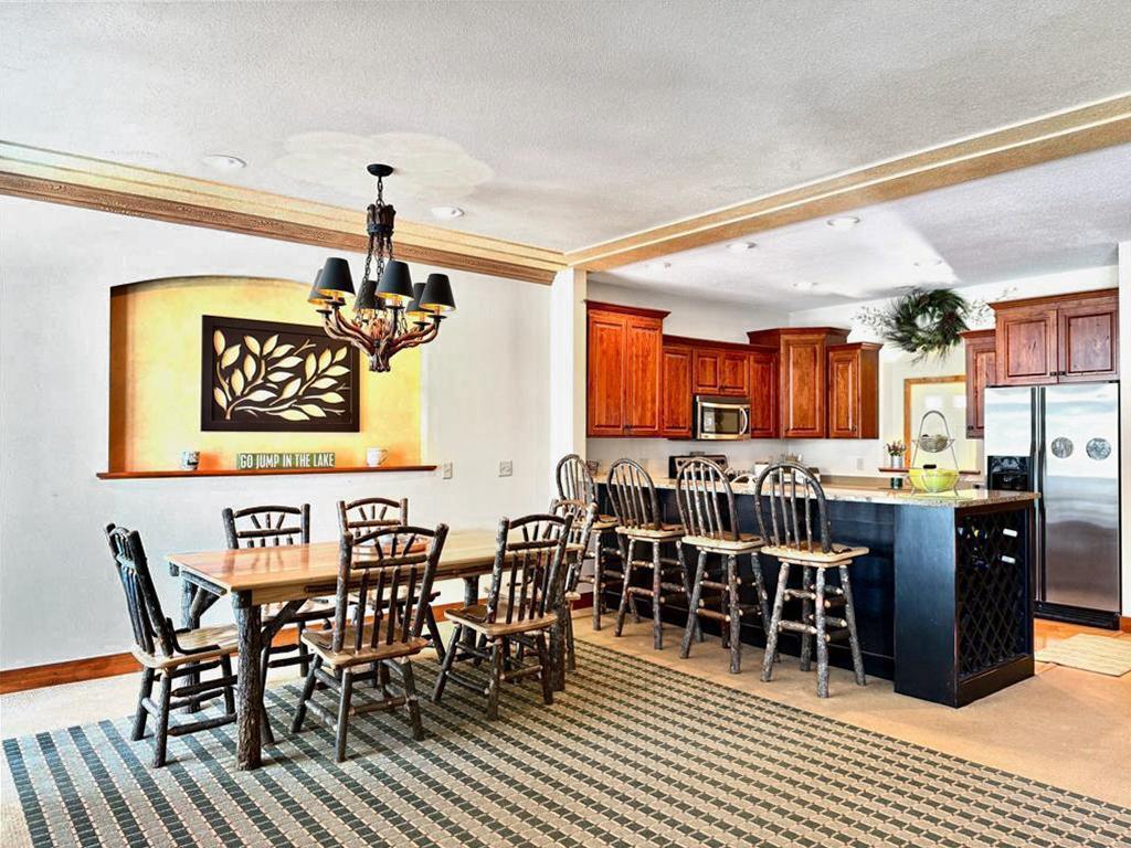 Dining room, fully furnished, snack bar view.