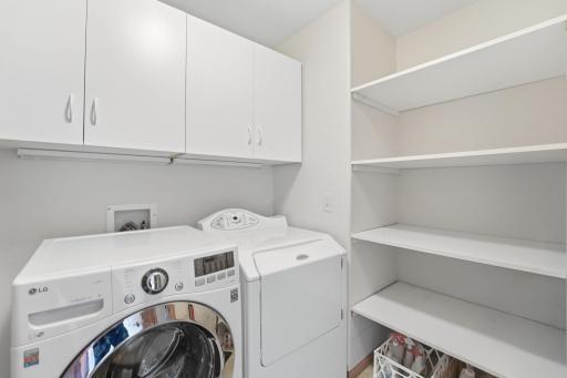 917 Anderson Way Alexandria, MN 56308 Main floor laundry with more storage and cupboards to keep things neat and organized.