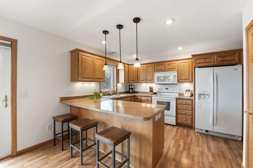 917 Anderson Way Alexandria, MN 56308 The kitchen is complete with a breakfast bar, cabinet pull outs, a nice sized pantry and a desk to keep life organized.