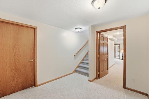 917 Anderson Way Alexandria, MN 56308 The lower level offers a family room with a second fireplace, another bedroom, full bathroom, storage/hobby room and a utility room.