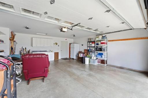 917 Anderson Way Alexandria, MN 56308 Nice and clean garage, offers shelving and a counter workspace with cabinets and a sink for convenience.