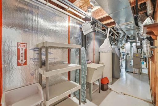 917 Anderson Way Alexandria, MN 56308 Utility room, with utility sink and added feature is the step saver water softener system - no need to haul bags up and down the steps (local subscription required)