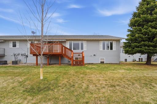 917 Anderson Way Alexandria, MN 56308 Back side with deck and sun/shade awning.