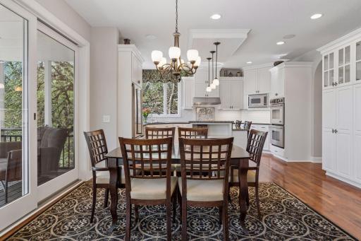 Dinette space with sliding doors to screen porch