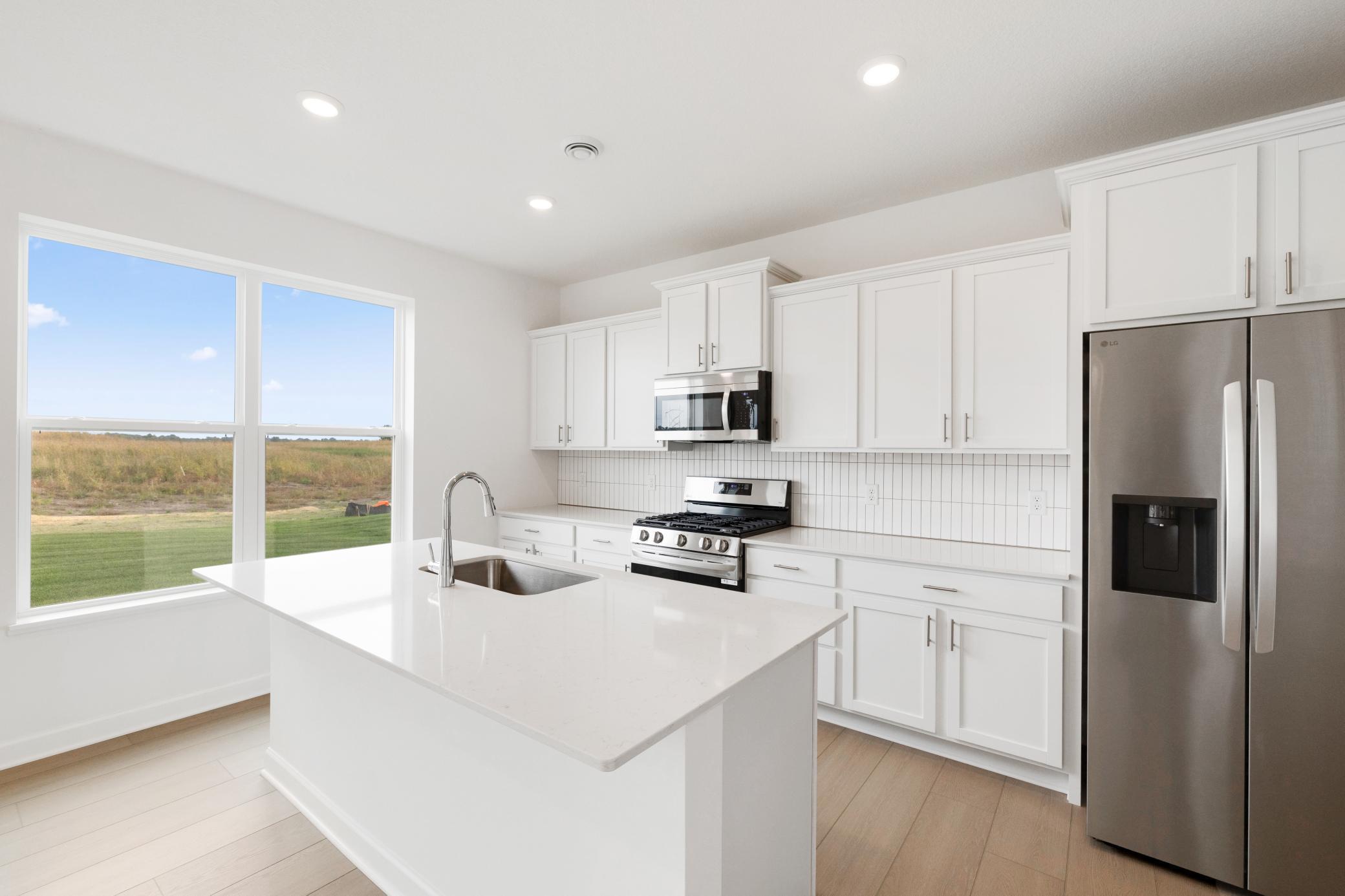 (Photo of a similar home, actual finishes may vary!)