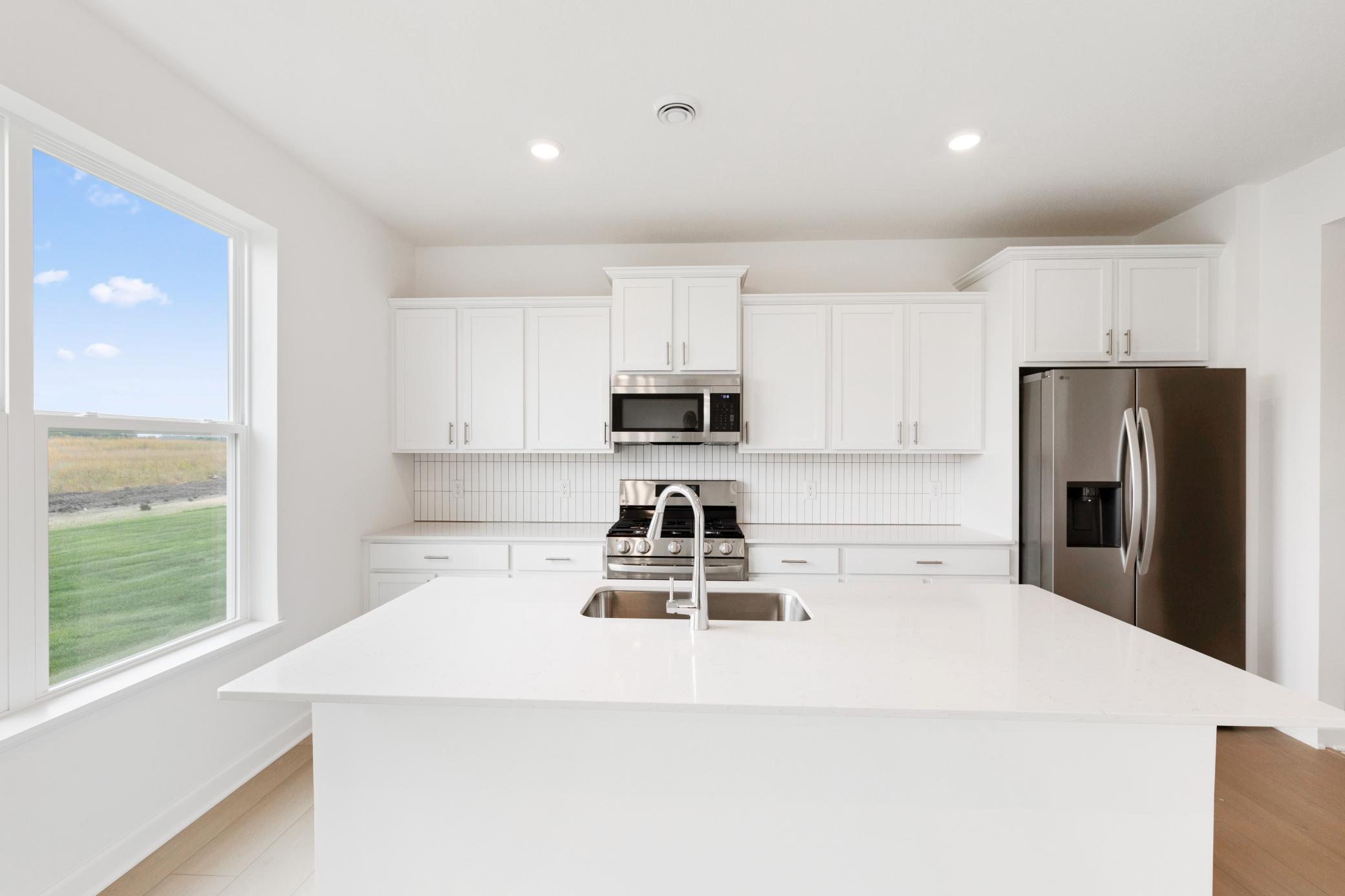 (Photo of a similar home, actual finishes may vary!)