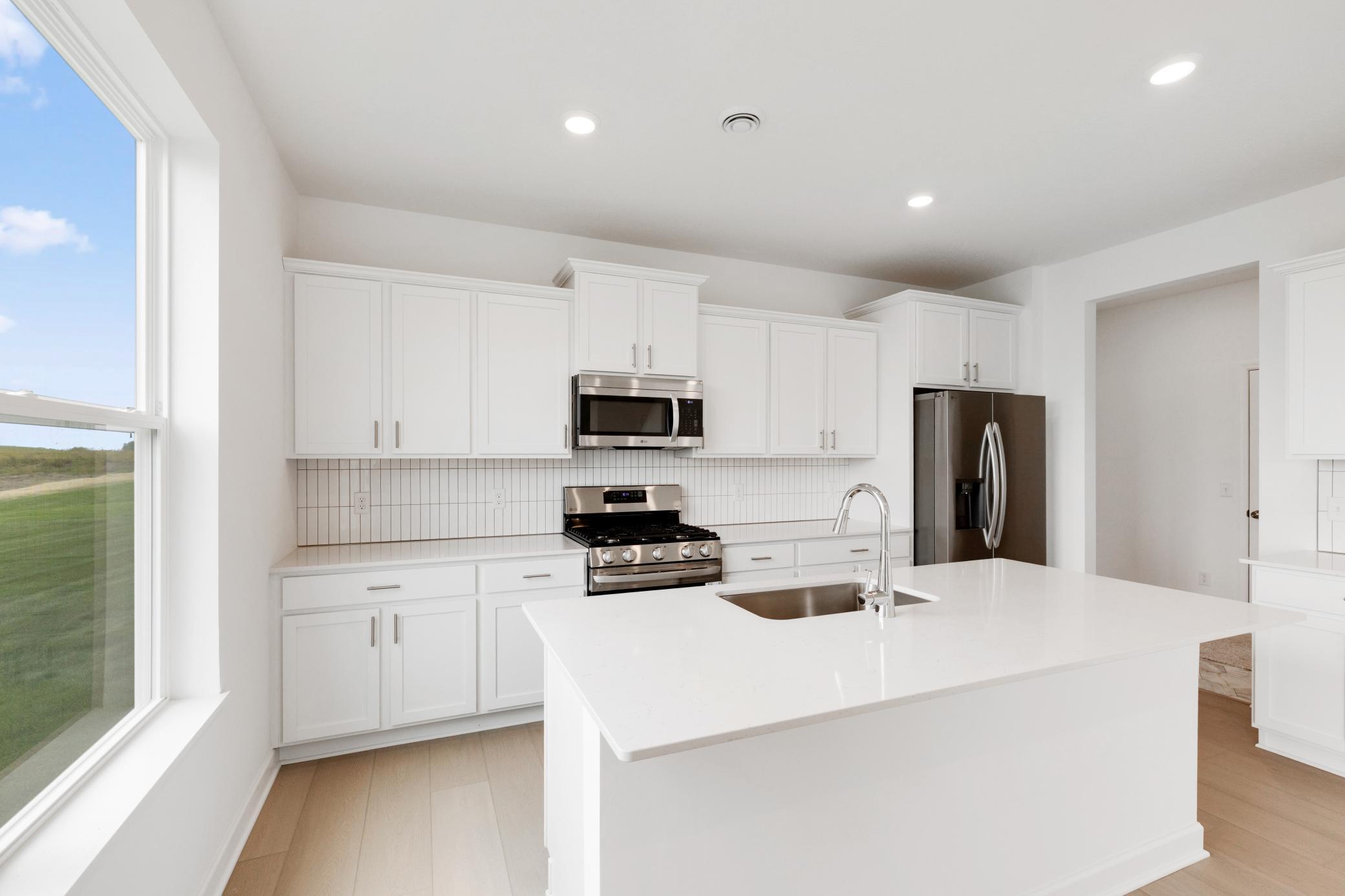 (Photo of a similar home, actual finishes may vary!)