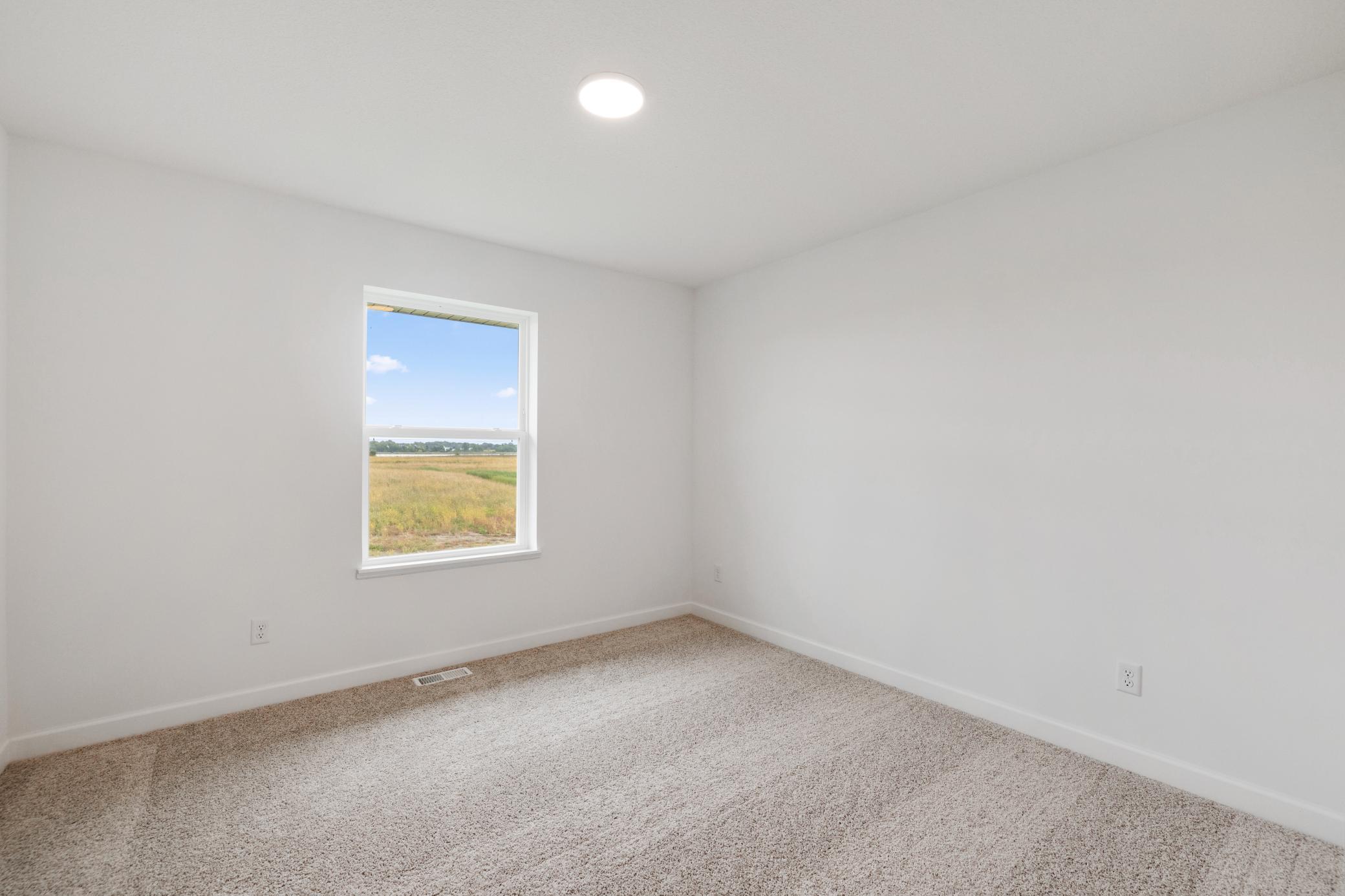 (Photo of a similar home, actual finishes may vary!)