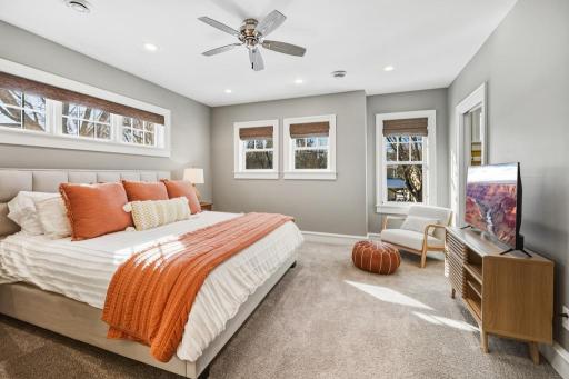 The primary bedroom strikes a rare balance â open and airy, yet cozy and comfortable.