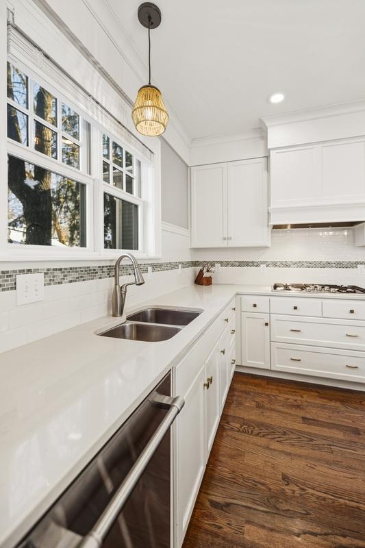 Ample cabinets keep everything tucked away, keeping the room clean and uncluttered.