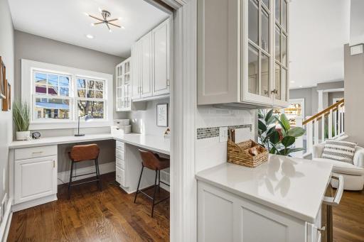 Tucked just off the kitchen, this versatile office works perfectly as a quiet workspace.
