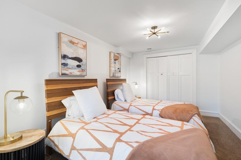 With a bedroom and bathroom on this level, it’s perfectly suited for hosting weekend guests who come to spend their days on the lake, their afternoons exploring Excelsior, and their evenings relaxing here.