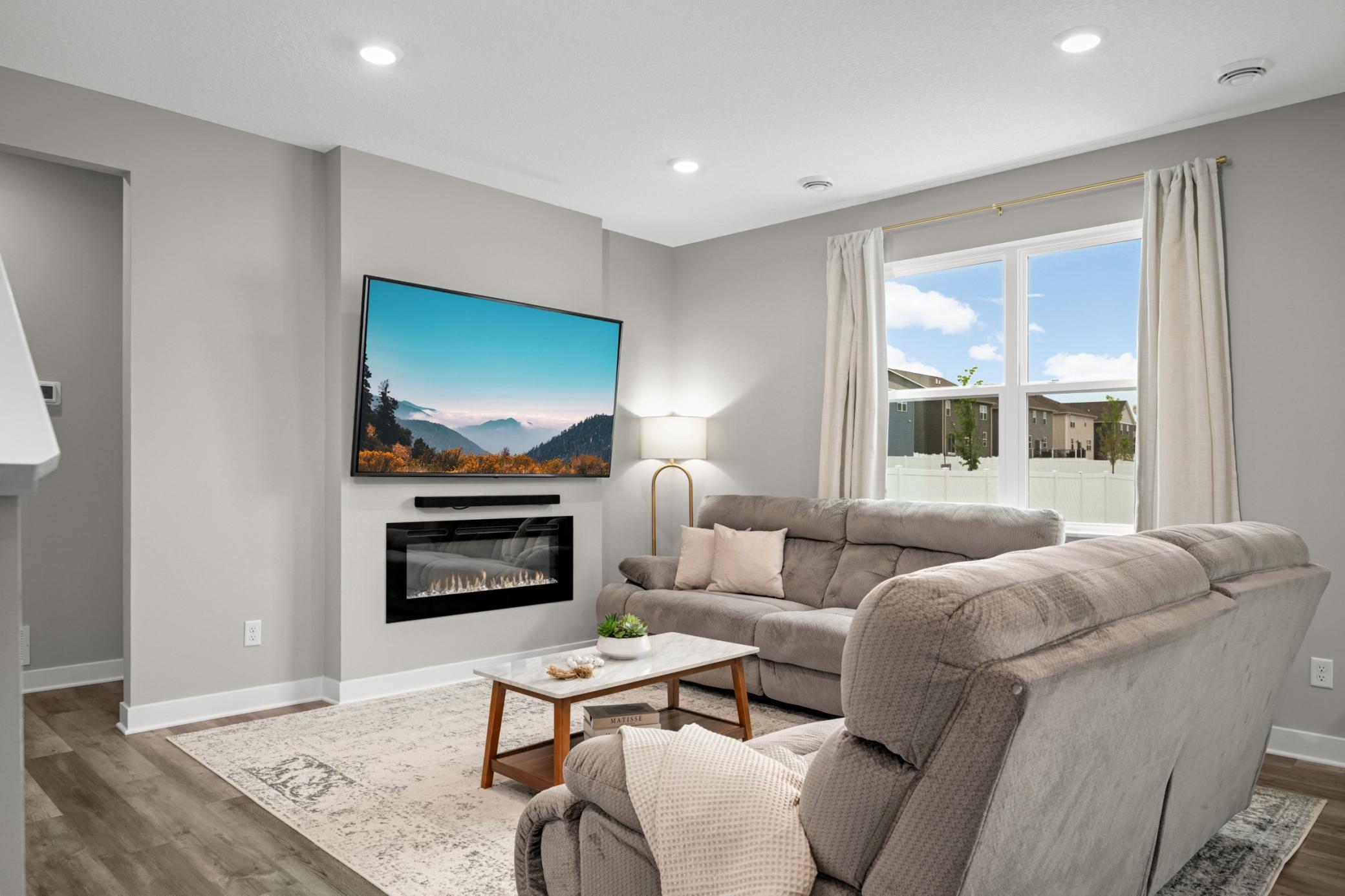 Enjoy relaxing by the warm fireplace.
