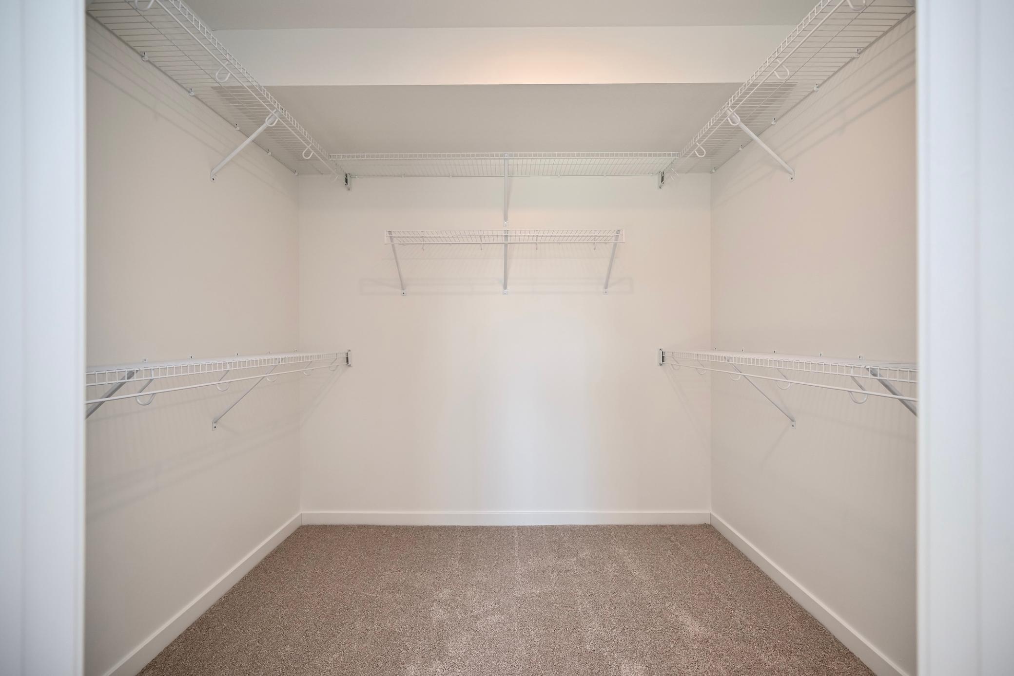 13 Primary Walk-in Closet.jpg