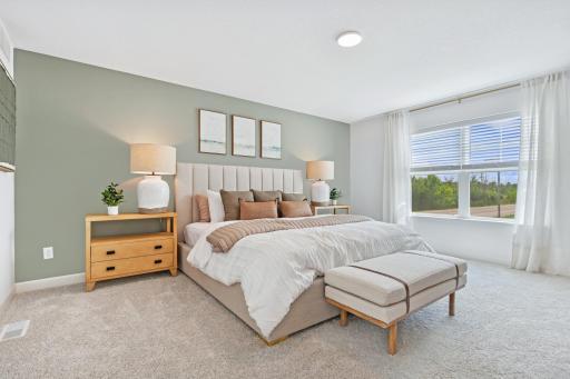 (Photo of model home, features will vary) Nestled on the top floor, the private ownerâs suite boasts a spacious bedroom to provide restful nights and a tranquil haven for relaxation, complemented by an en-suite bathroom and large walk-in closet.