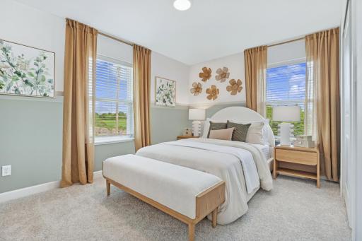 (Photo of model home, features will vary) The larger of the two secondary bedrooms, this retreat is ideal for residents who require more personal space and privacy.