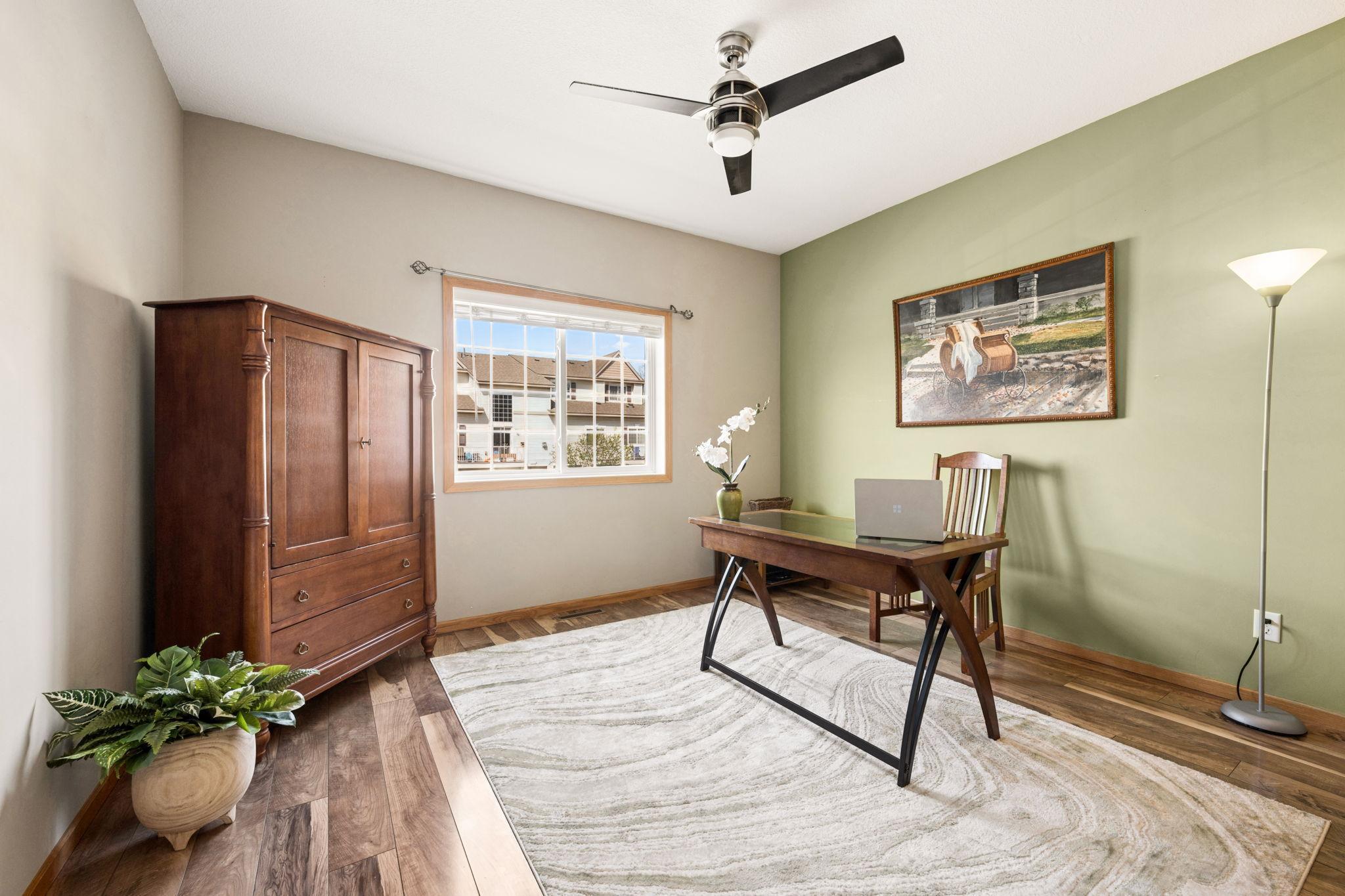 A versatile main-level space perfect for a home office, guest room, or workout area—designed to adapt to your lifestyle.