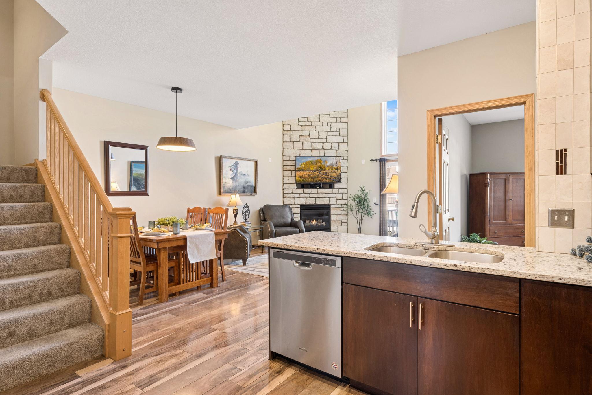 Open layout from kitchen to living and dining areas creates an easy, connected flow. Ideal for entertaining or staying engaged while cooking.