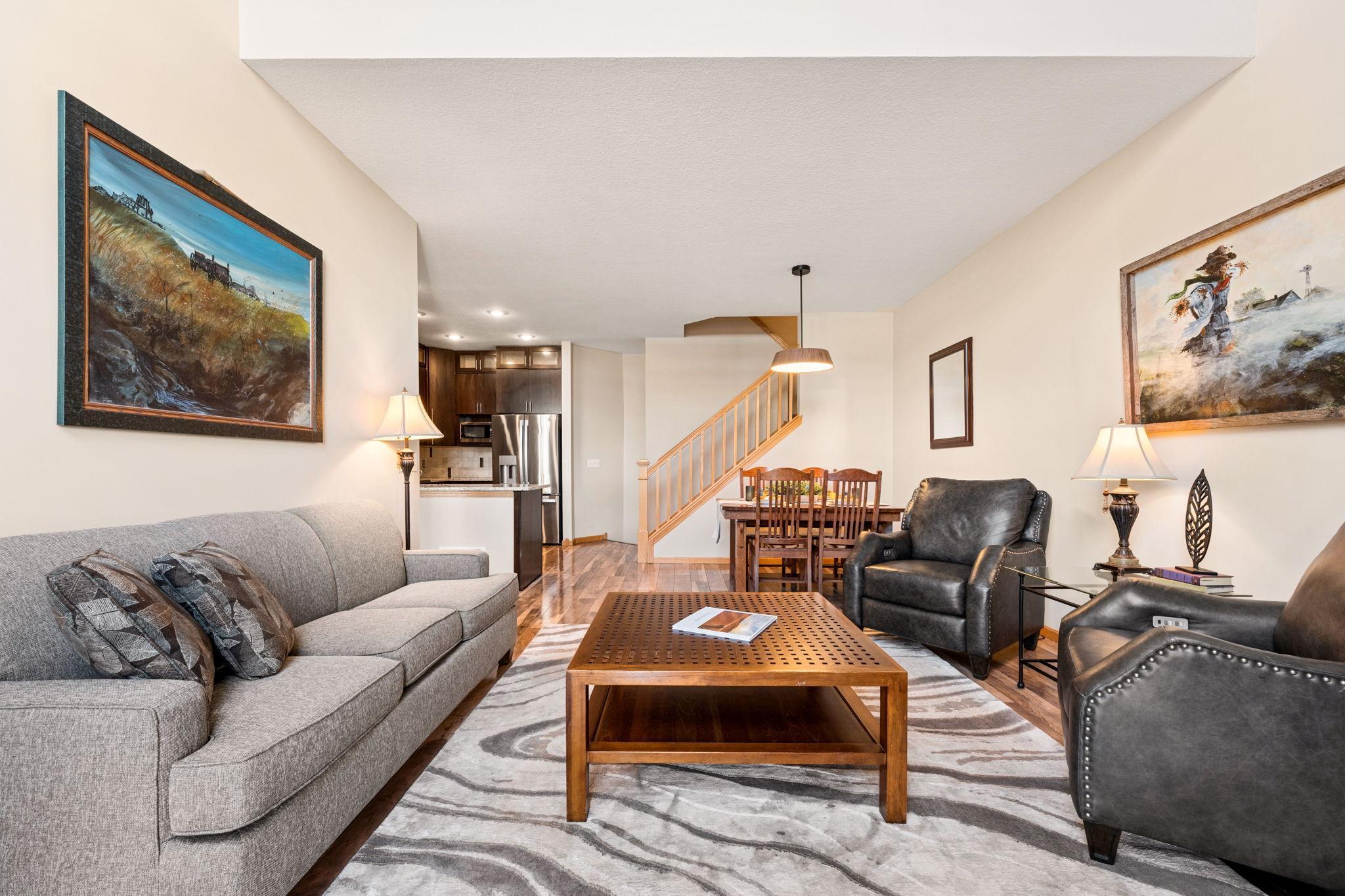 Bright, open, and inviting—this living space is designed for comfort with an easy flow into the rest of the home.