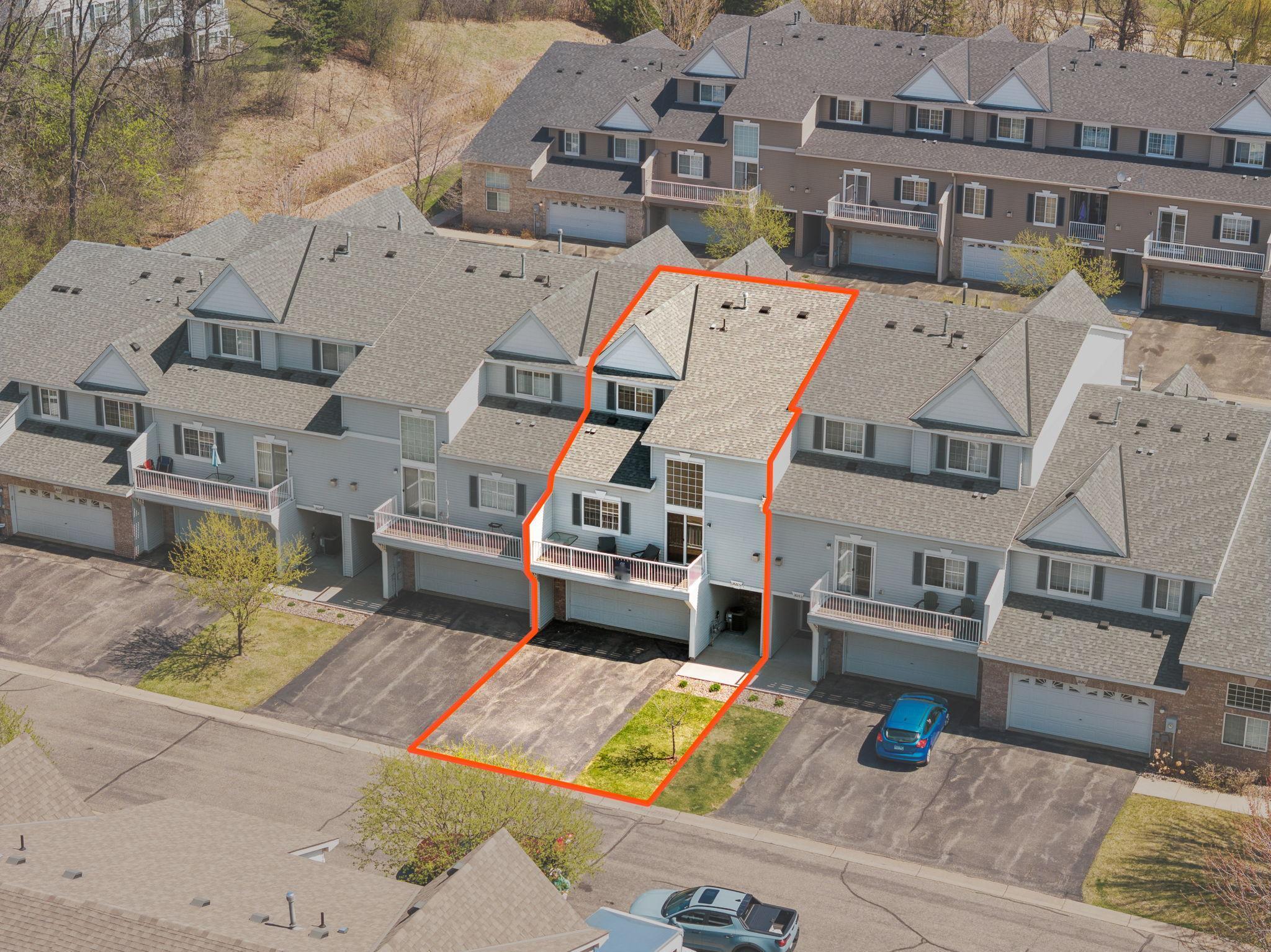 Easily identify your new home—this beautifully positioned townhome offers both privacy and convenience within the community.