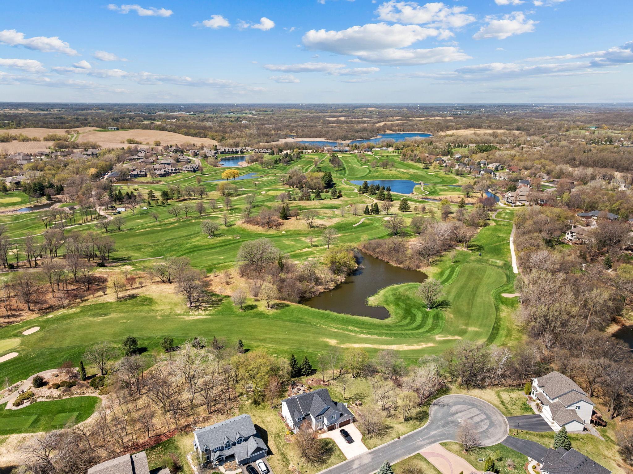 Surrounded by beautifully maintained green space and nearby golf courses, adding to the area’s charm and appeal.