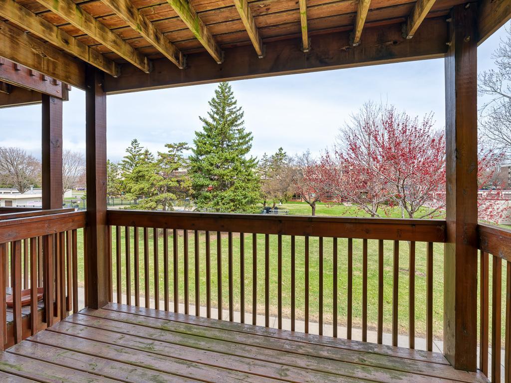 Enjoy the mature trees and views of the pool from your private balcony.