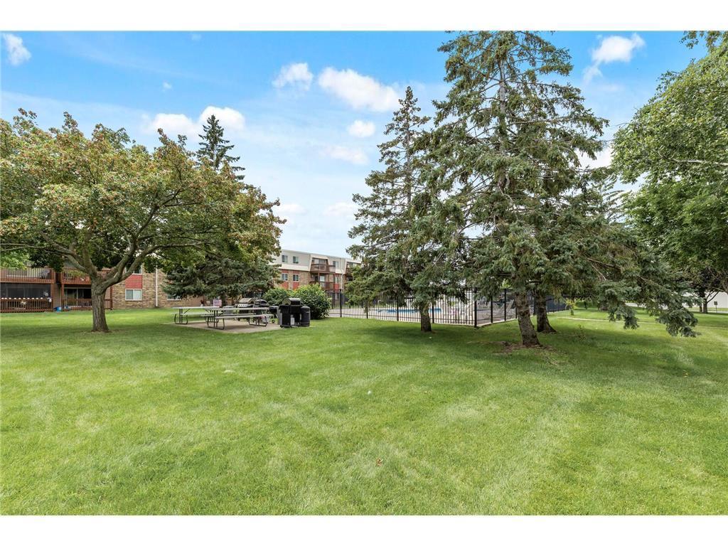 The well manicured green space is perfect for summer fun and grilling.