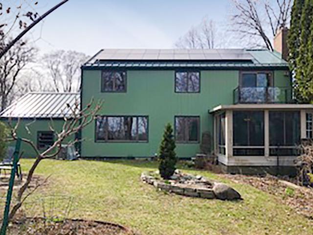 Screen porch to enjoy the natural setting.