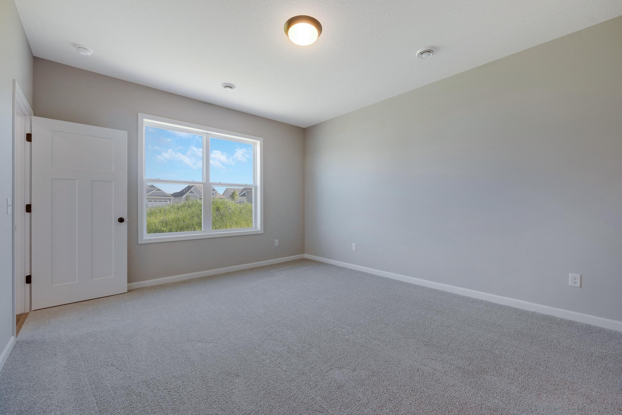 Owner's bedroom. Photo of similar home. Not actual home. Styles and finishes will vary.