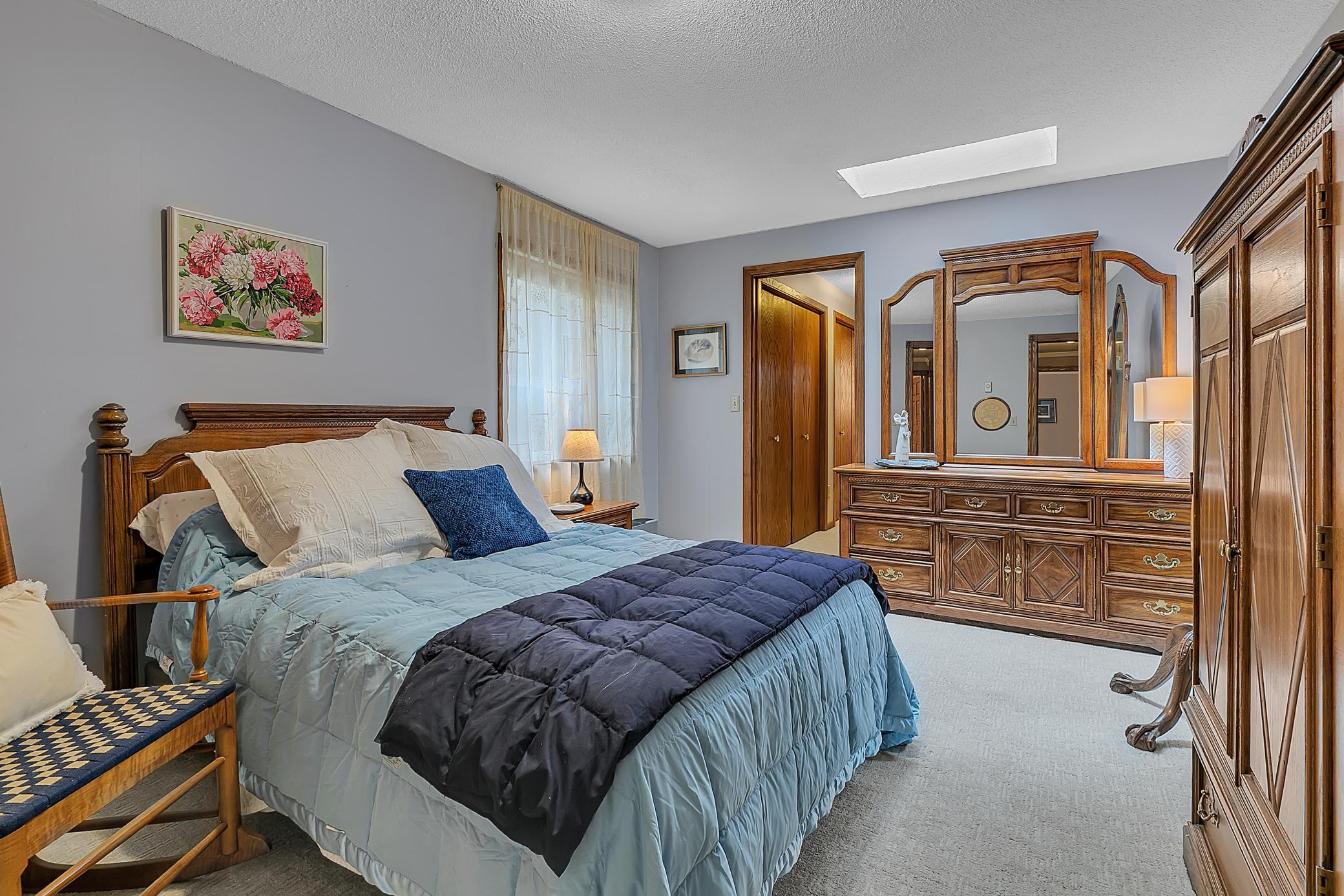 The primary bedroom is so spacious with a generous sized closet.