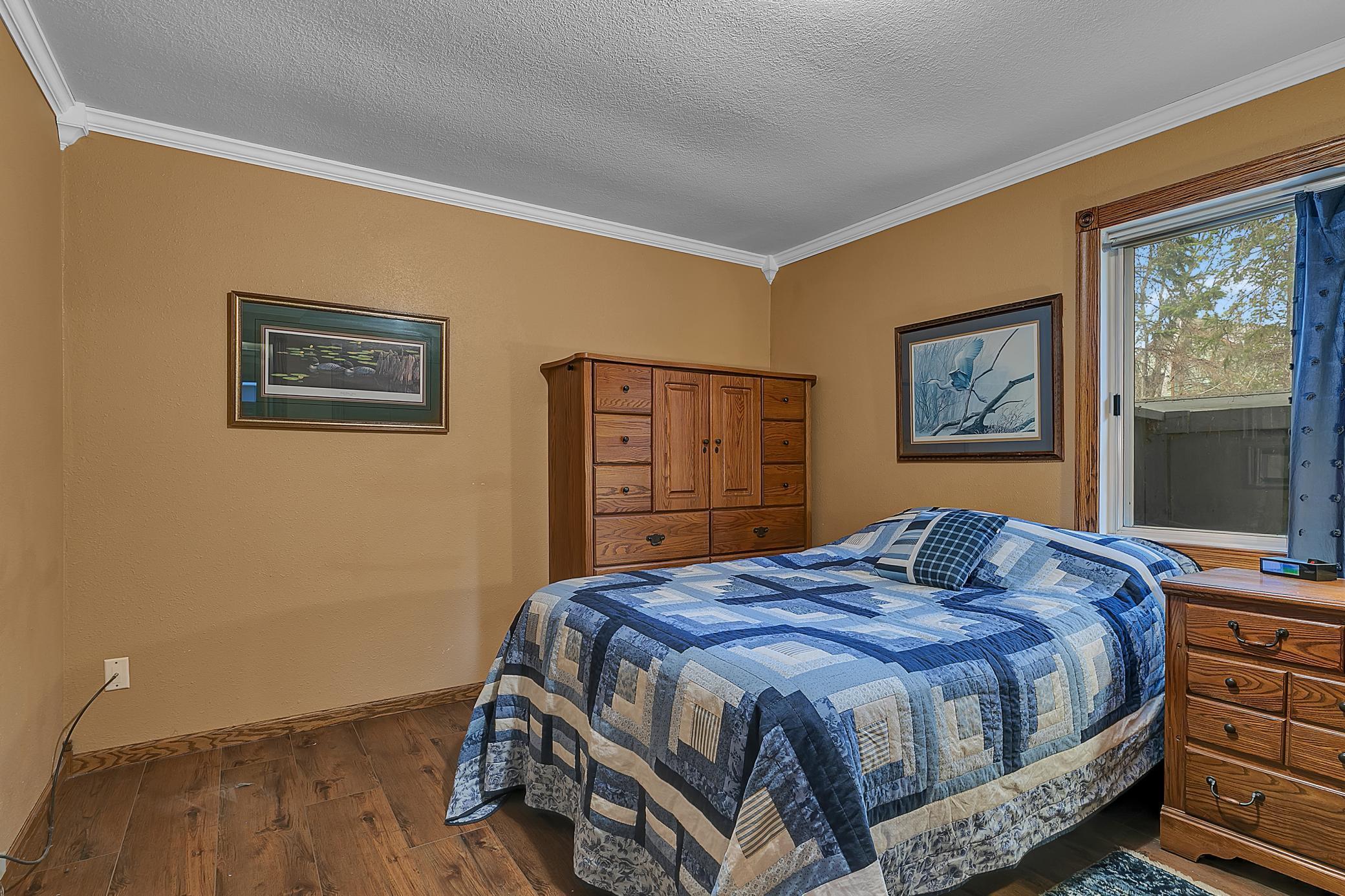 The 2nd of three bedrooms. The room has lots of natural light and a large closet.