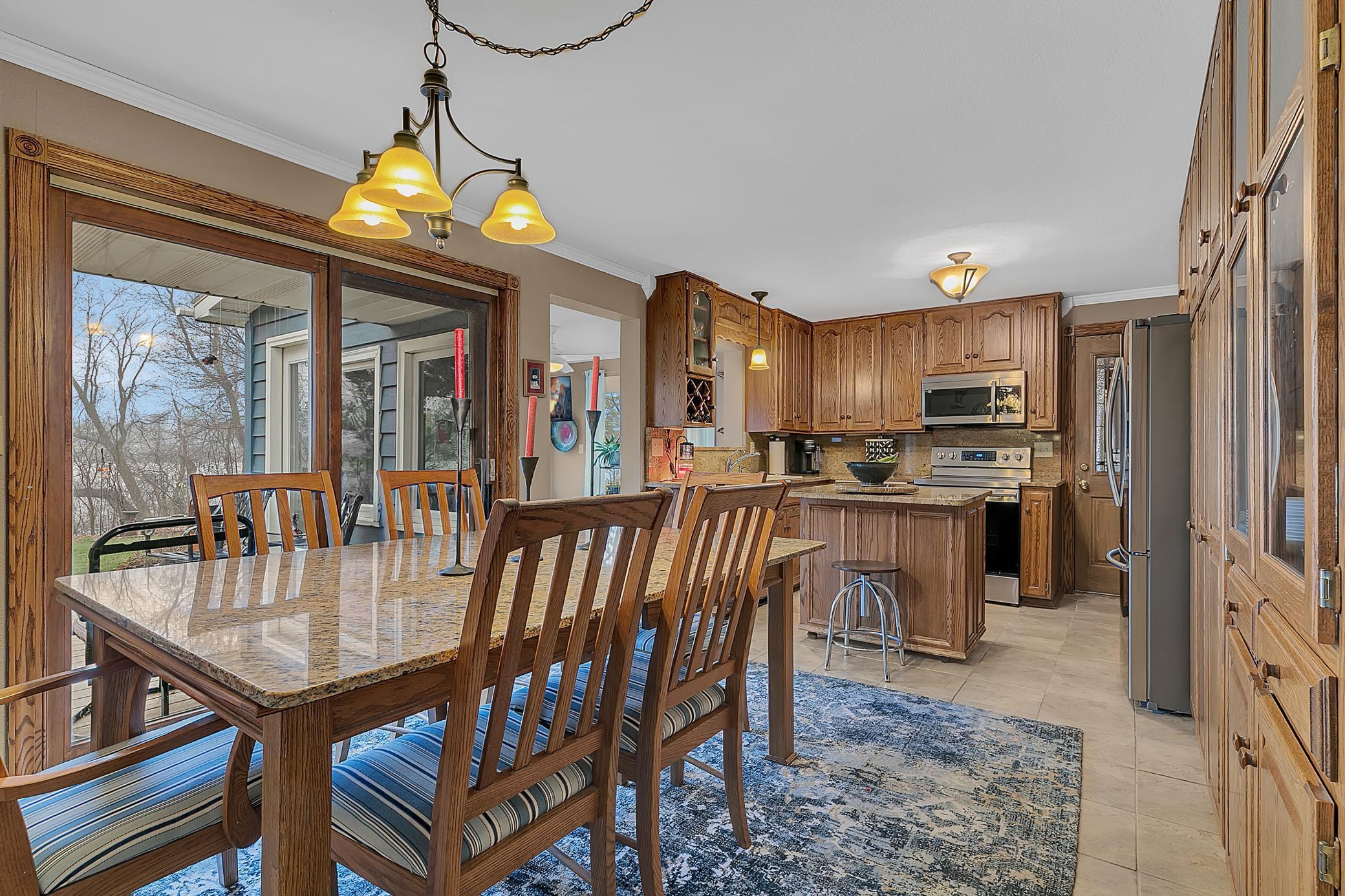 The dining room has a sliding door leading to the 40' deck.
