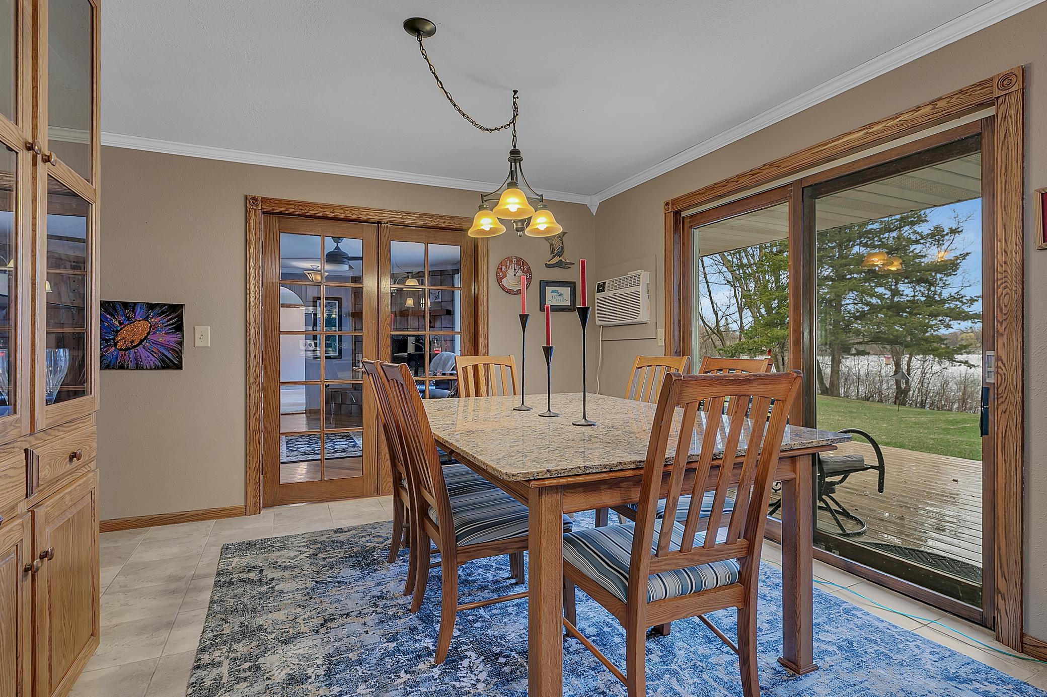 There are custom French doors leading into the family room.