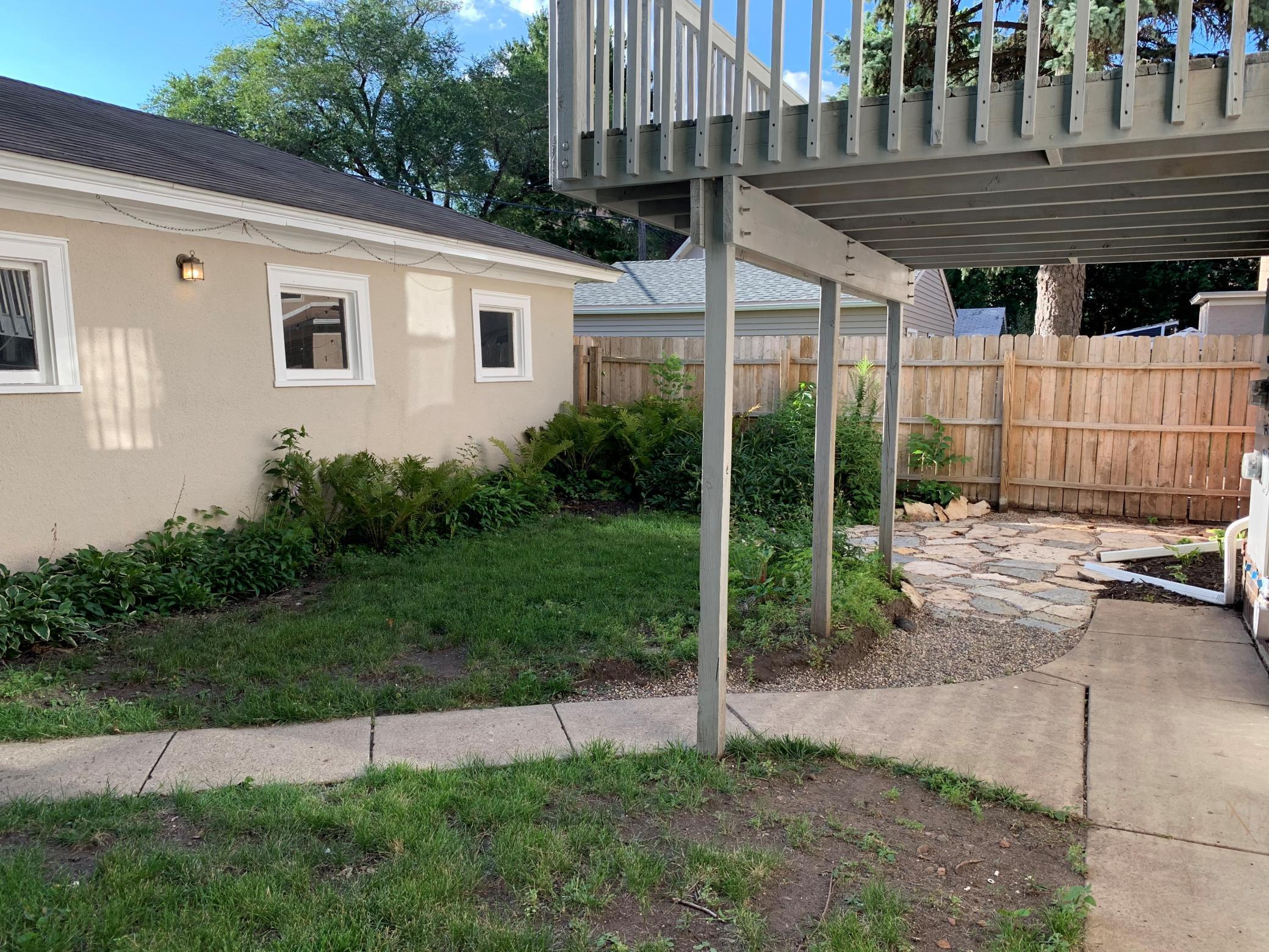 Deck, 3 Car Garage, and Back Yard Garden Area.jpg