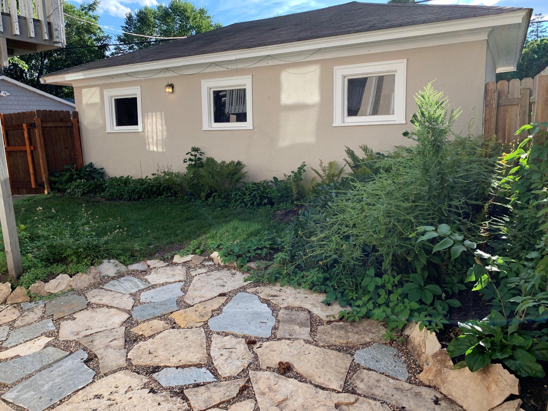 Patio, Back Yard Garden and 3 Car Garage.jpg