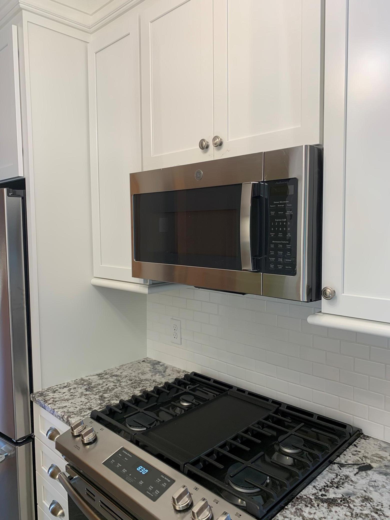 Unit 2 Kitchen Brand New Stainless Steel Microwave.jpg