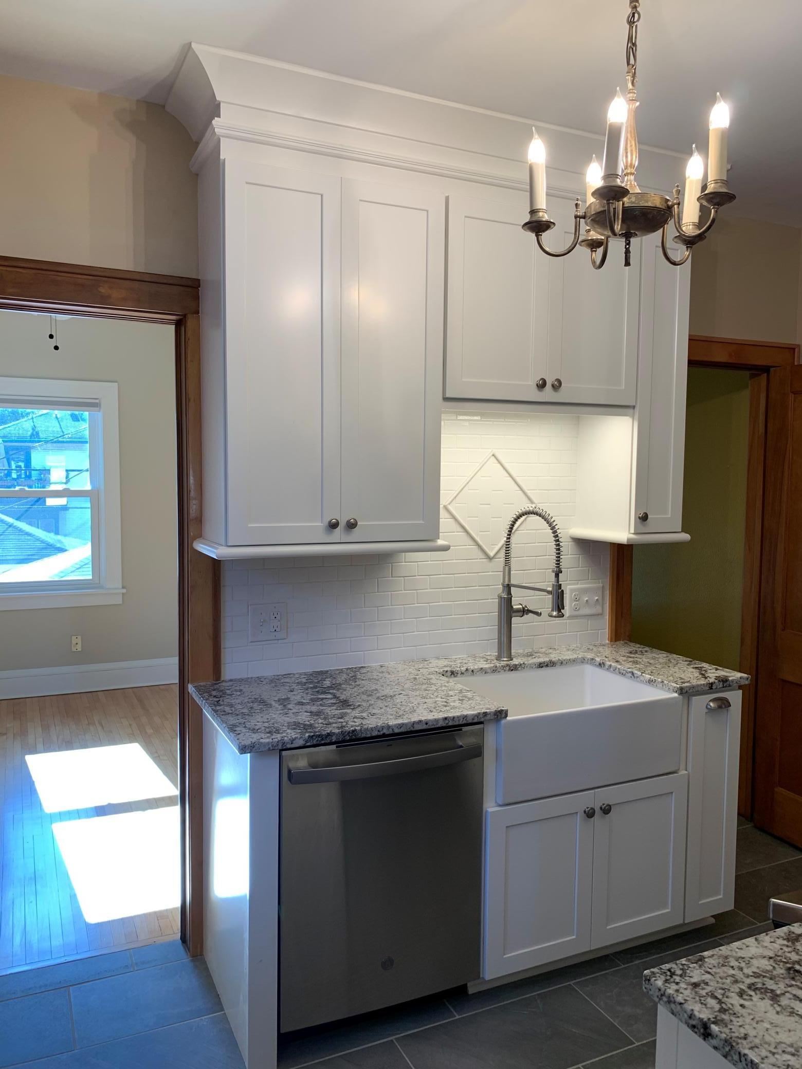 Unit 2 Kitchen Granite Counters, New Cabinets, and New Dishwsher.jpg