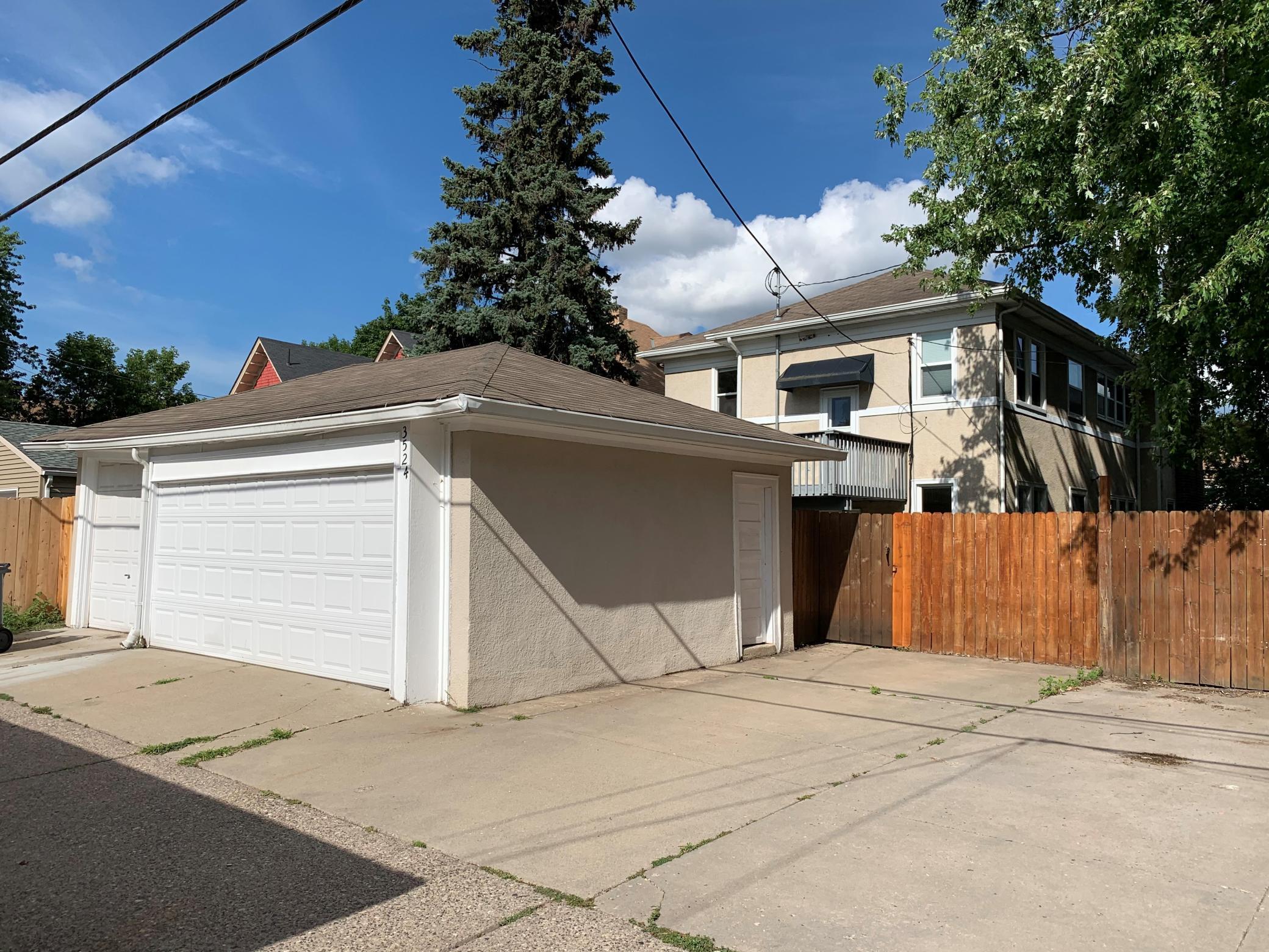 3 Car Garage and Extra Driveway Parking Place.jpg