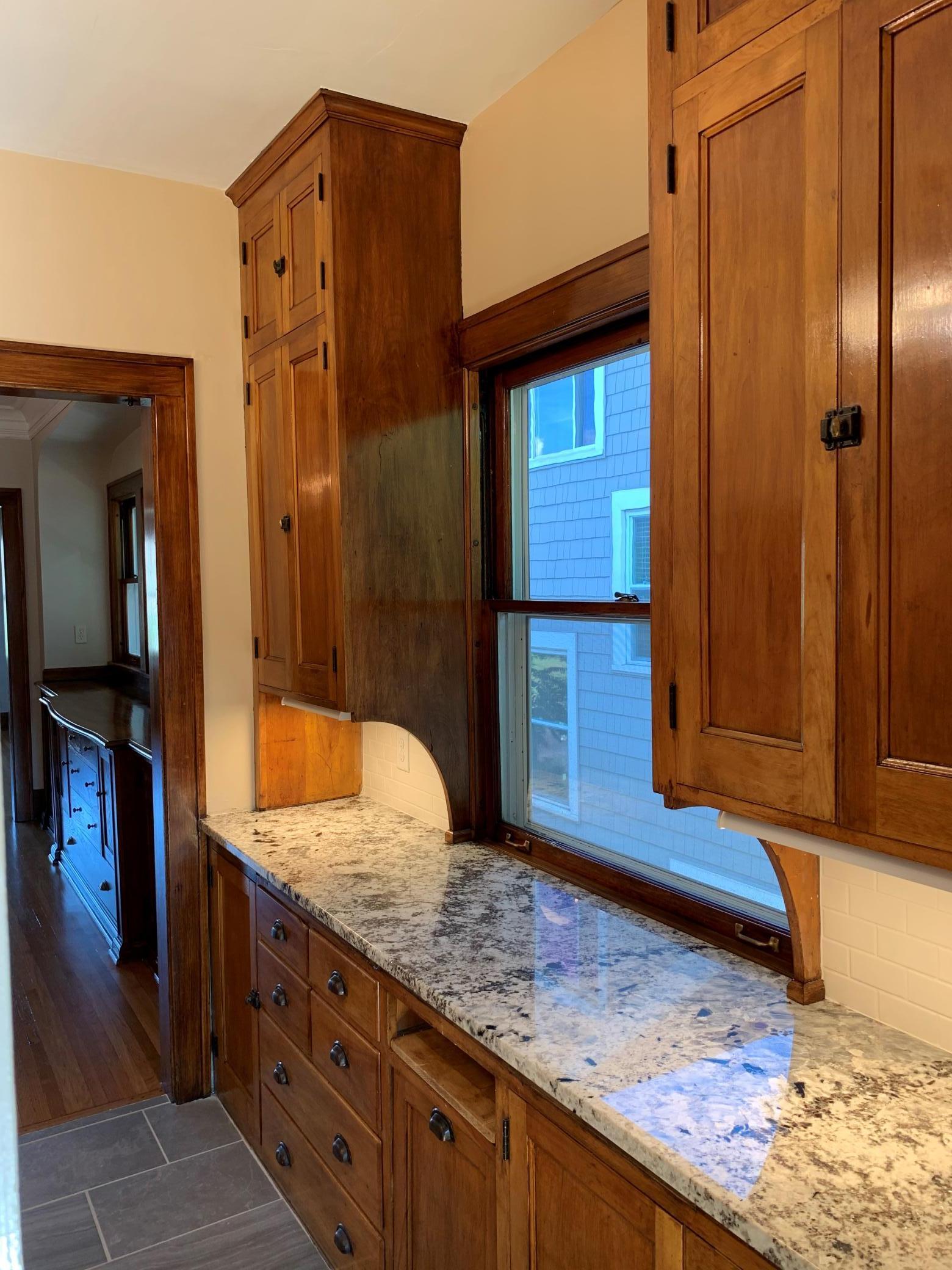 Unit 2 Kitchen Spectacularly Refinished Charming Cabinets.jpg