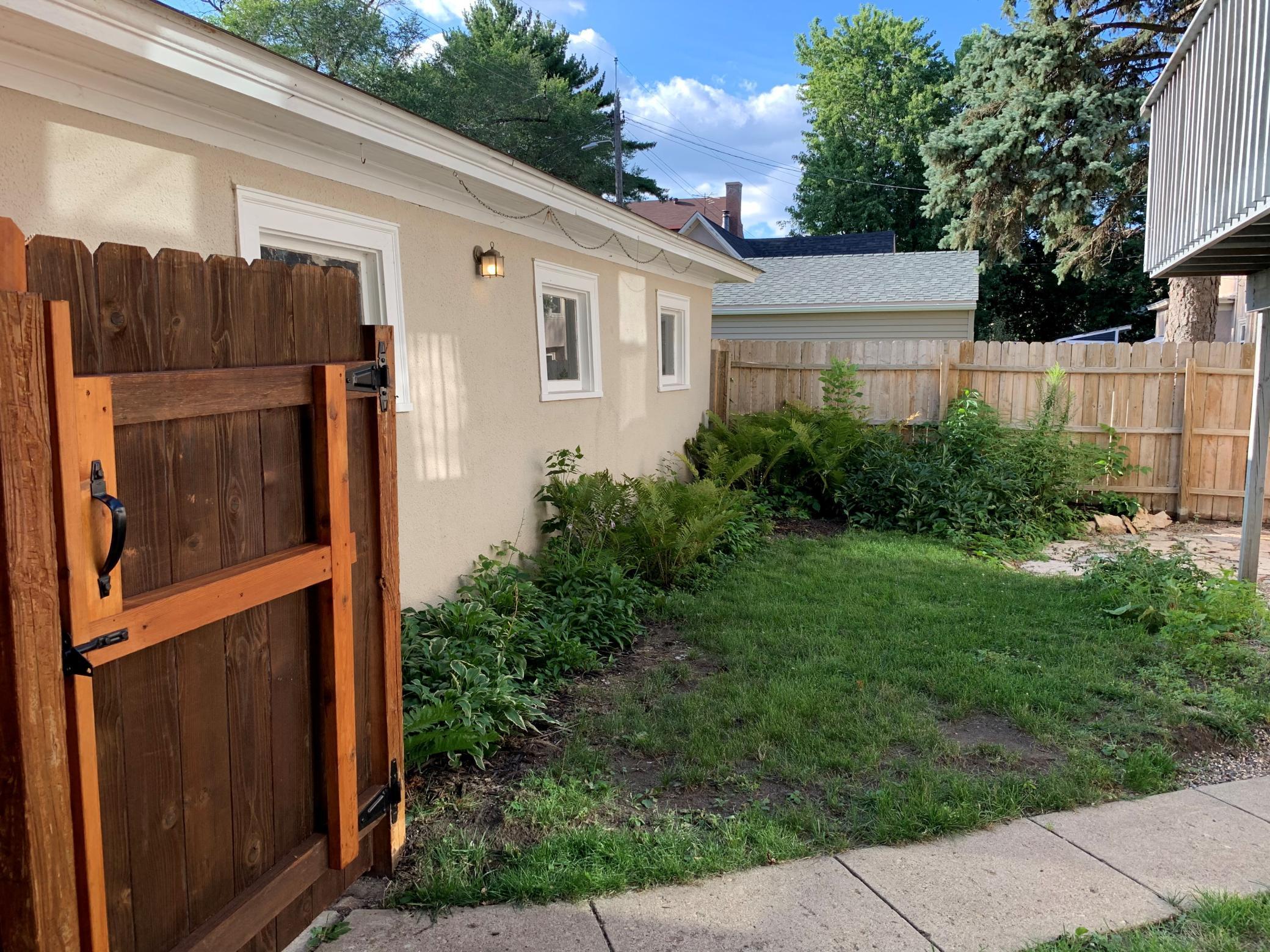 3 Car Garage and Back Yard Garden Area.jpg