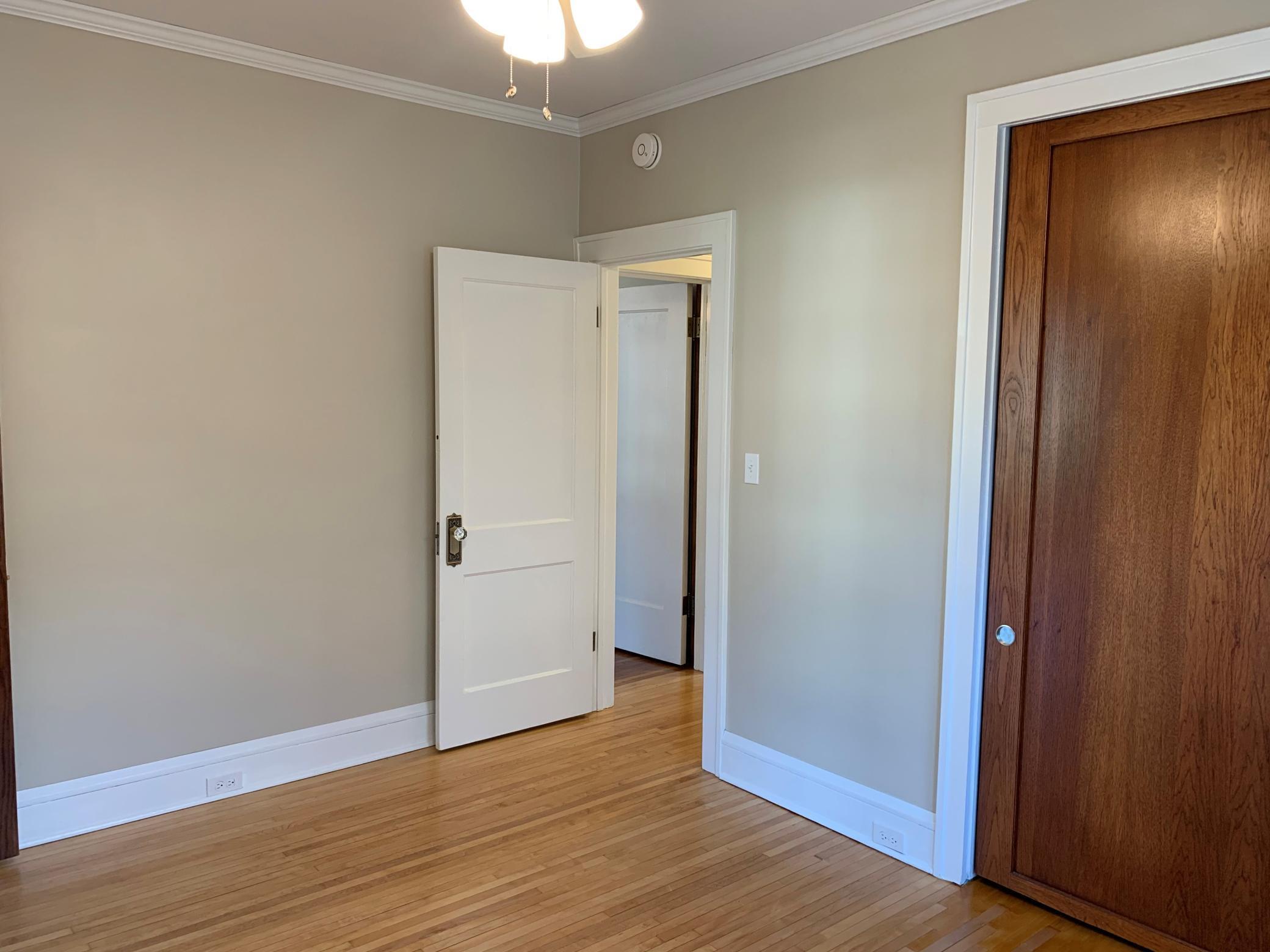 Unit 2 1st Bedroom with Beautifully Refinished Floors.jpg