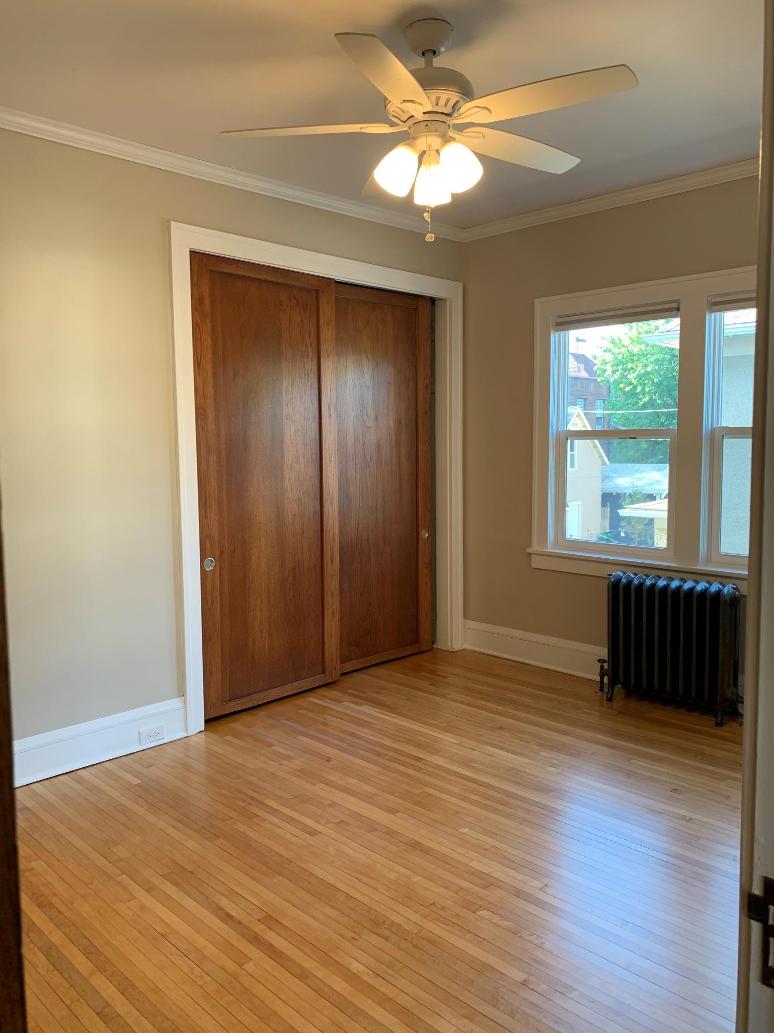 Unit 2 1st Bedroom with Large Closet and Ceiling Fan.jpg