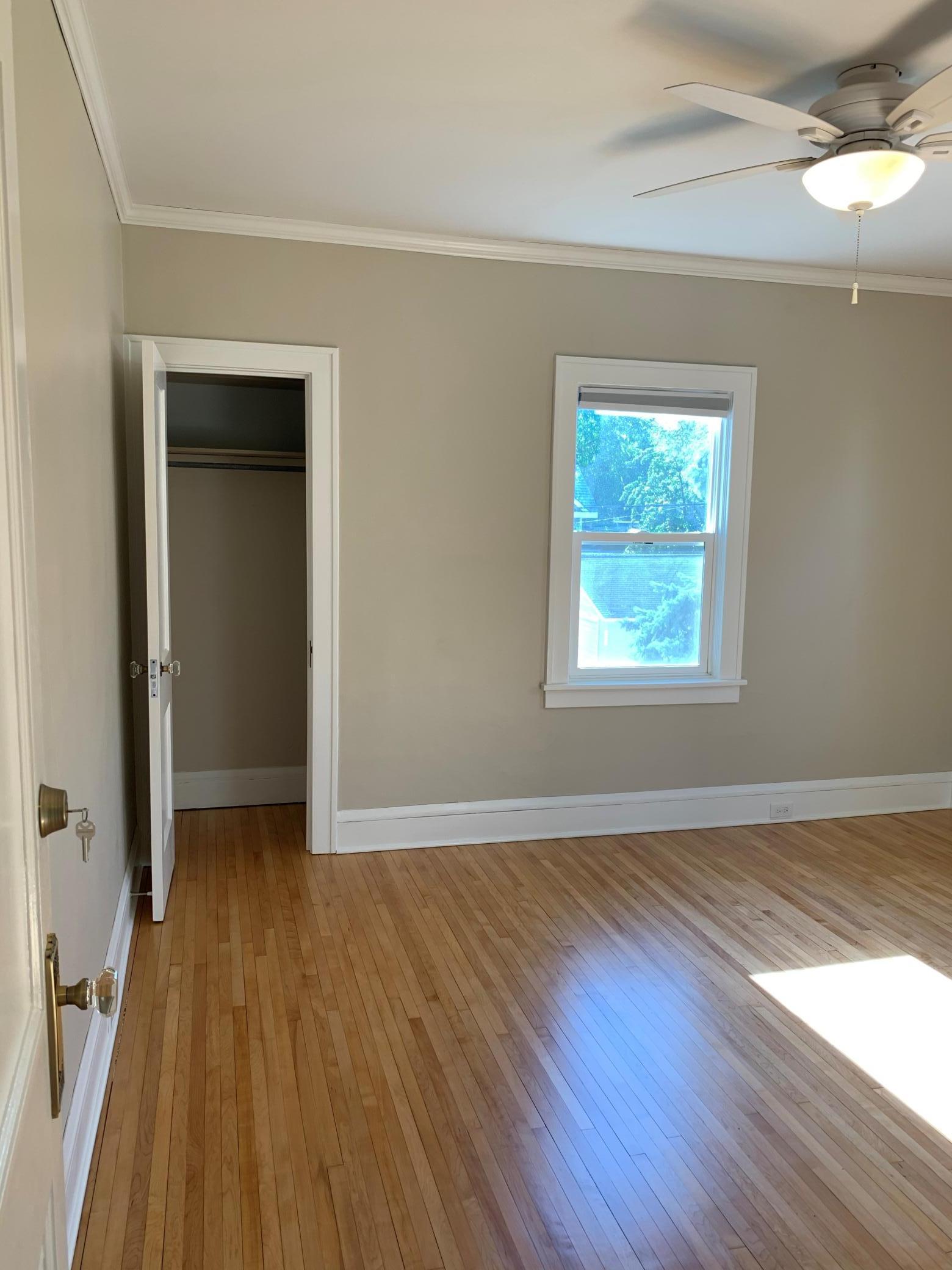 Unit 2 2nd Bedroom with Ceiling fan and Loads of Natural Light.jpg