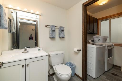 Main floor half bath with new LVP flooring
