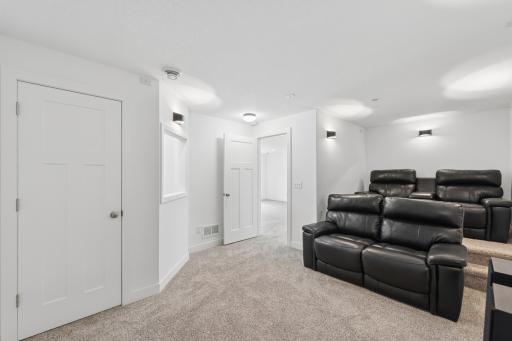 Lower level theater room is an amazing bonus to this home. Perfect for movie nights!