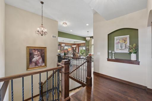 Spacious front entry with gorgeous dark hardwood floors.