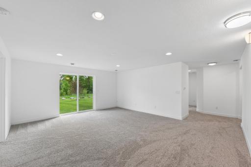 The living area is plumbed in for a future wet bar and has a gas line for a future fireplace.